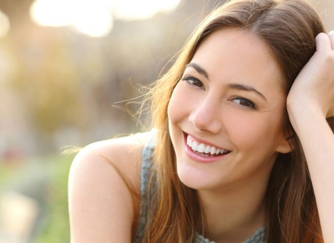 Girl smiling with perfect smile and white teeth